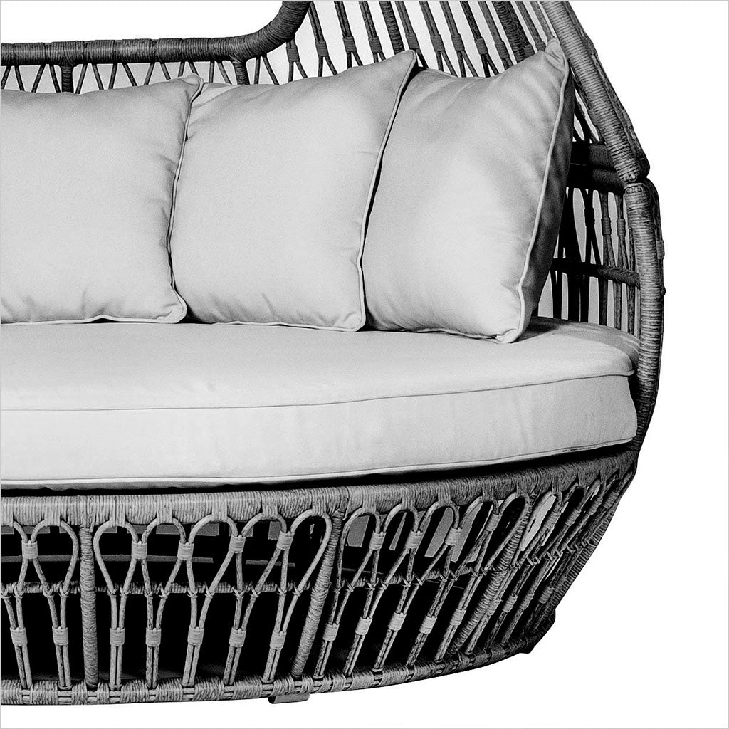 outdoor day bed in grey with seat cushion and 4 pillows