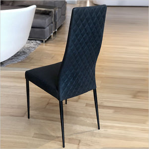 high back dining chair with quilted diamond back panel upholstered in leather