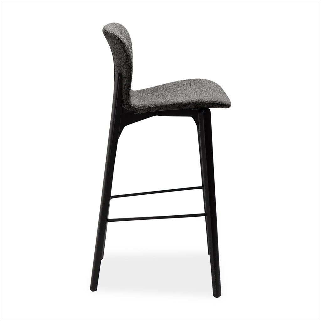 grey fabric counter stool with black legs