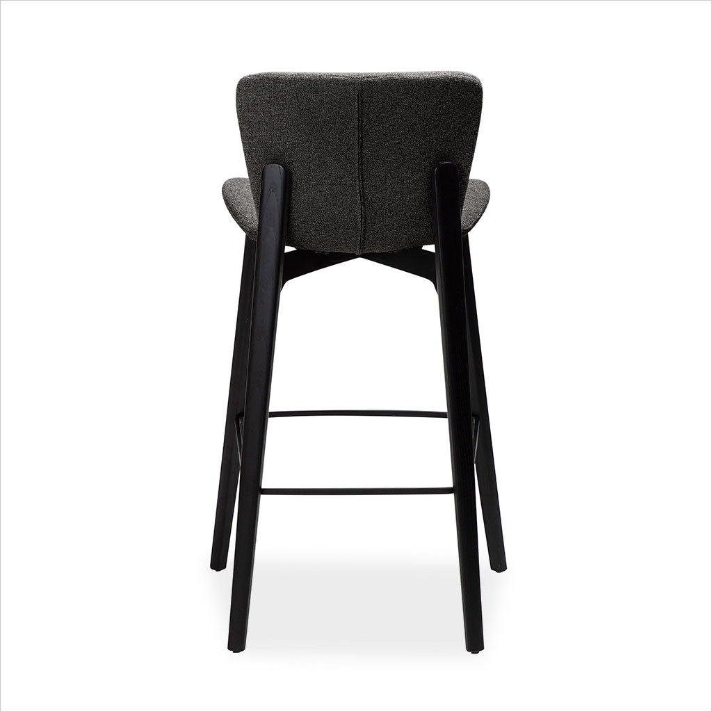 grey fabric counter stool with black legs
