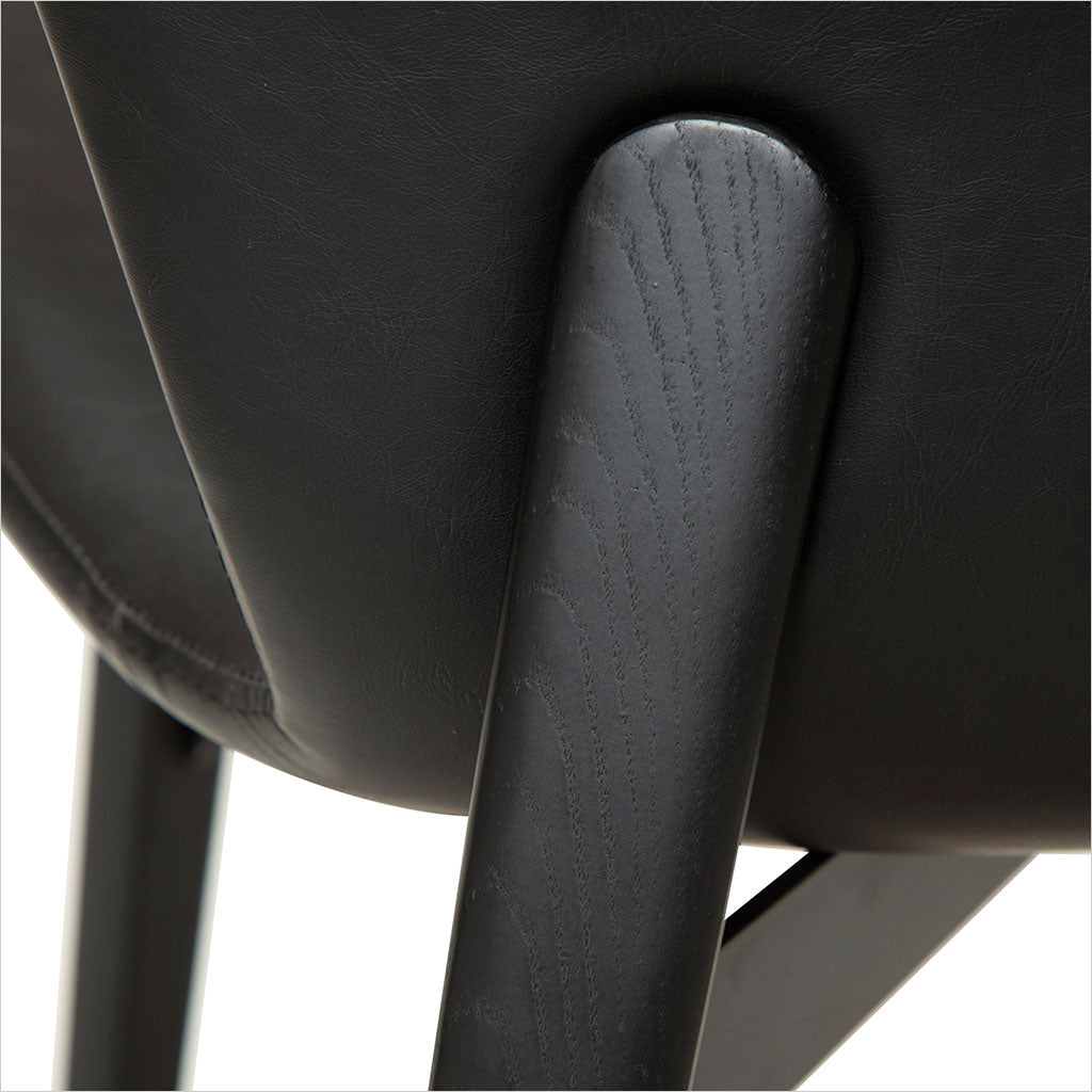 black leather counter stool with black legs