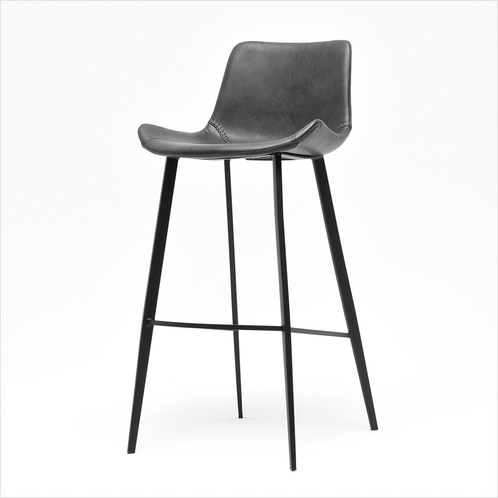barstool with baseball stitching along edges and curves