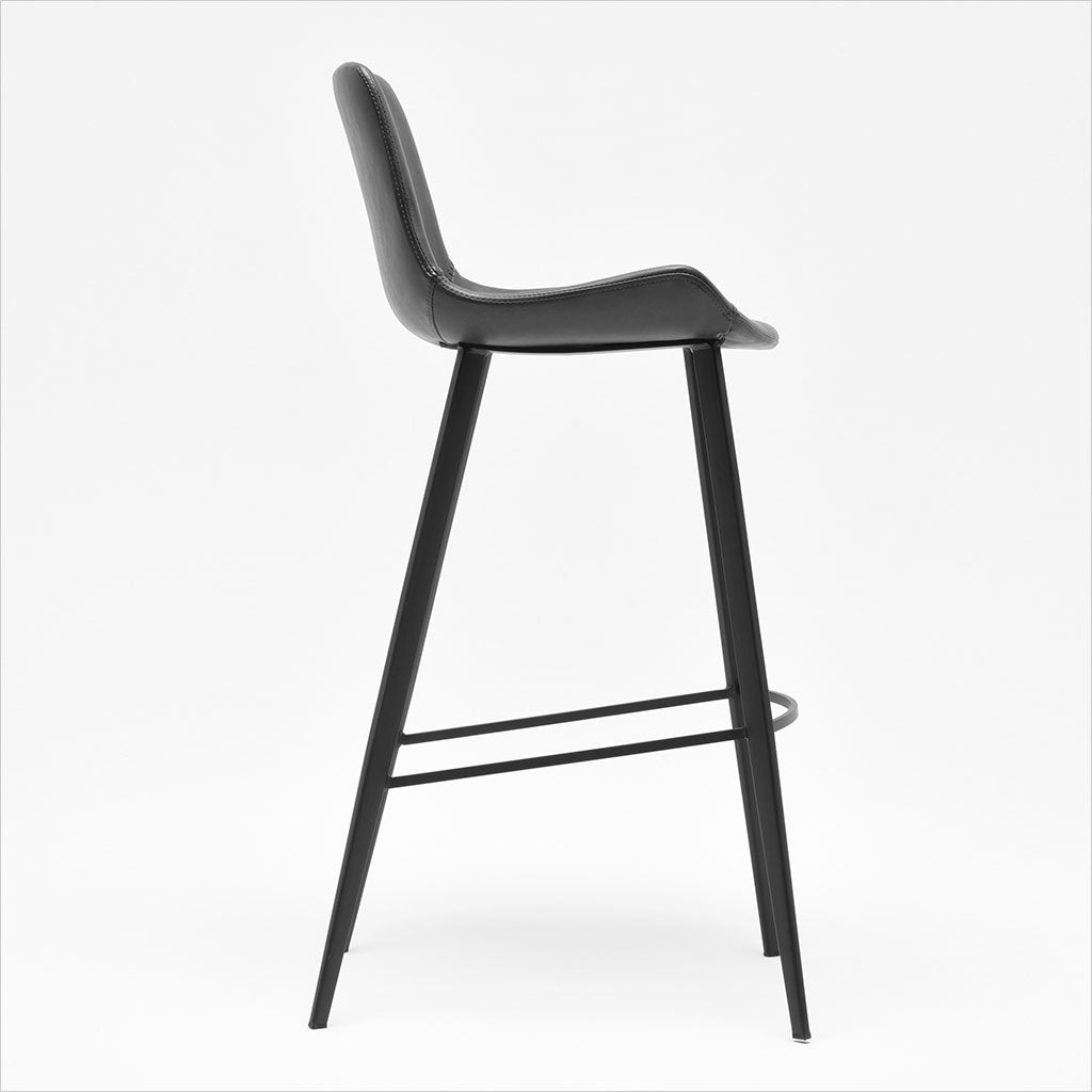 barstool with baseball stitching along edges and curves