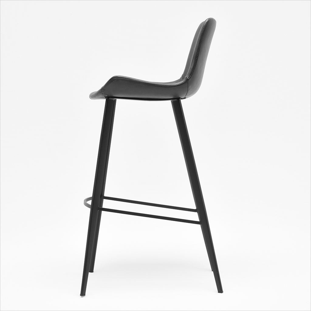 barstool with baseball stitching along edges and curves