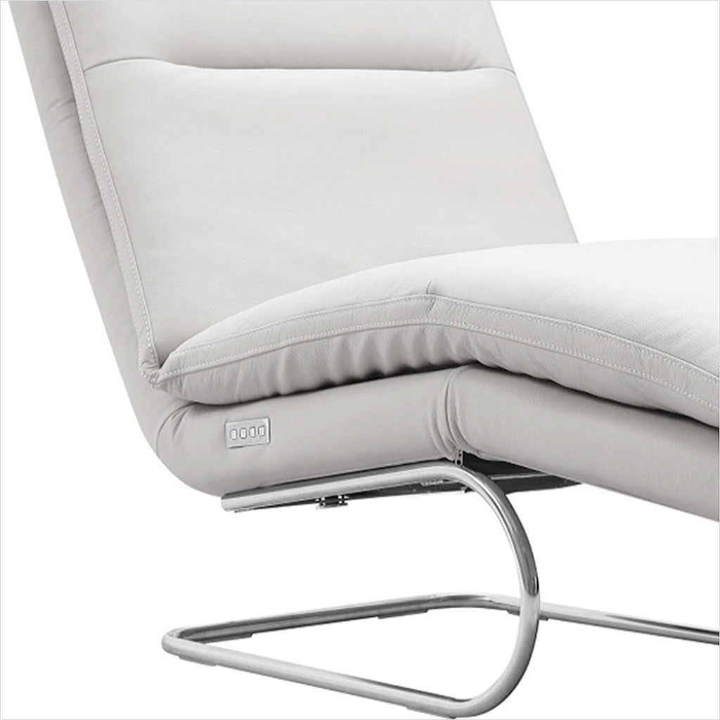 white leather lounge chair with cantilever base