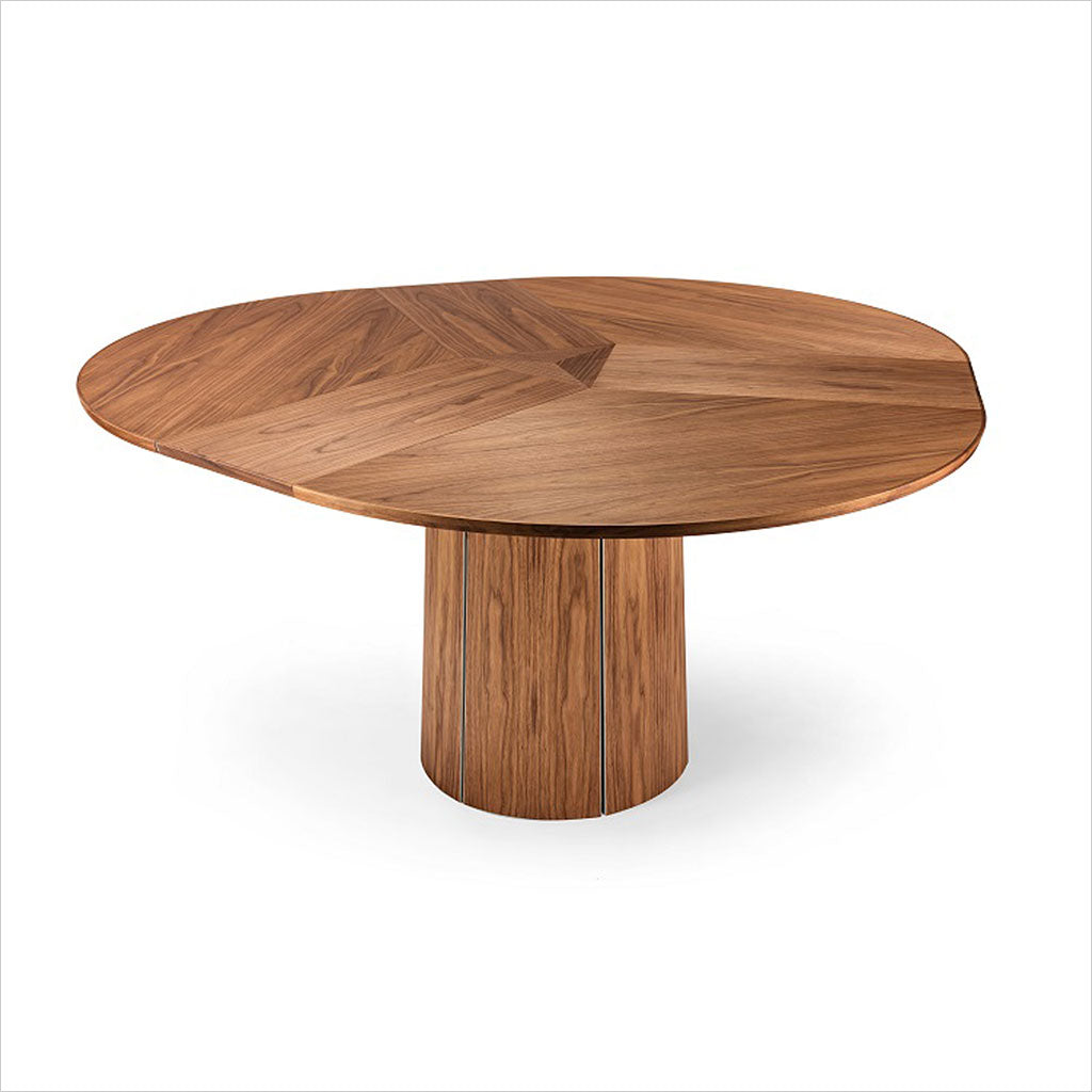 round dining table with extension leaves and pedestal base