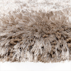adore area rug in taupe