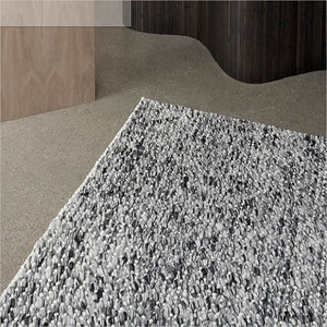 sigri area rug in charcoal
