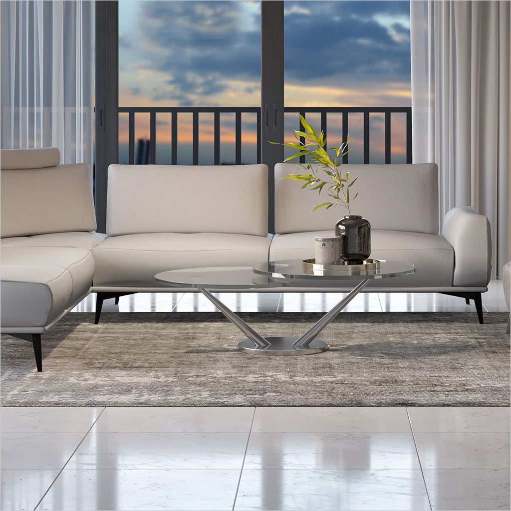 coffee table with 2 round, synchronized swivel glass tops