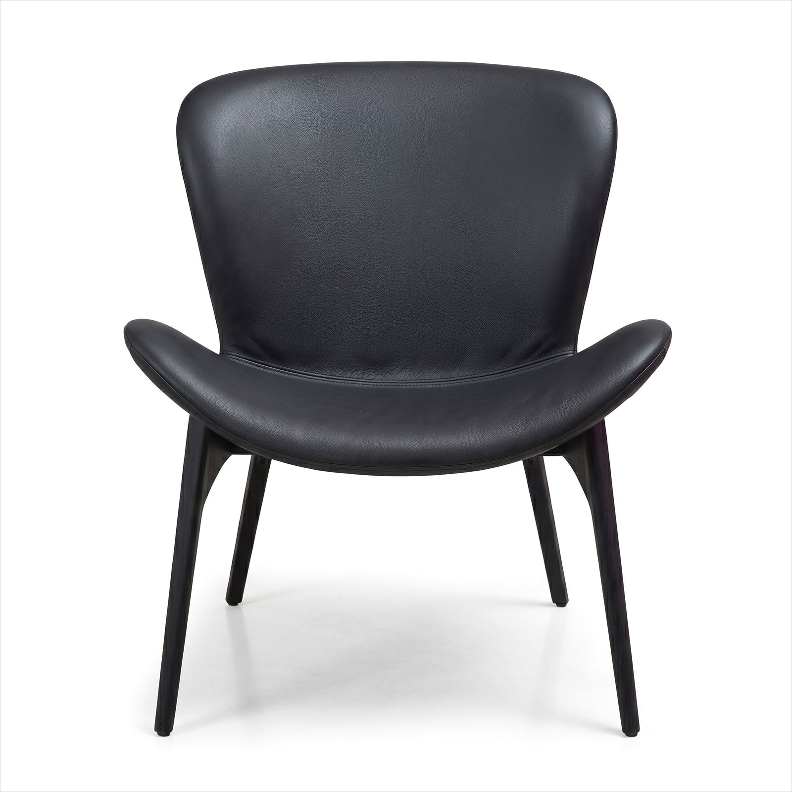 A modern black leather lounge chair with a curved backrest, integrated armrests, and four tapered legs, shown against a plain white background.