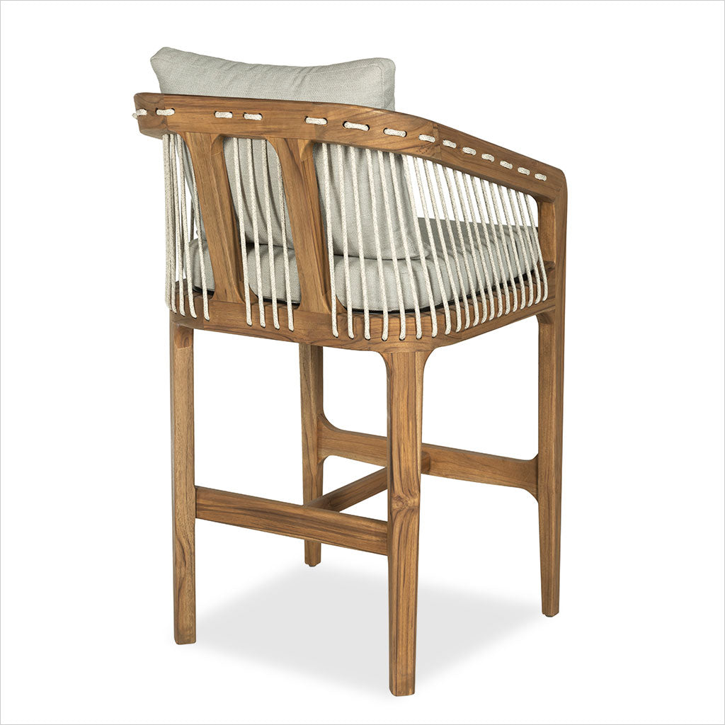 Barstool in teak wood with beige seat and back cushions on a white background