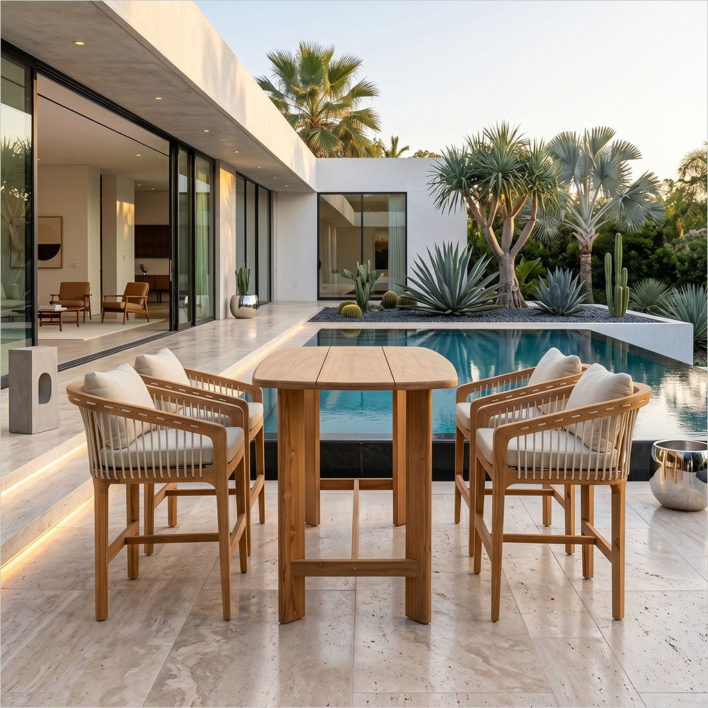 Outdoor patio set with wooden bar table and barstools by a poolside.