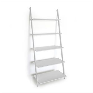 white leaning bookcase