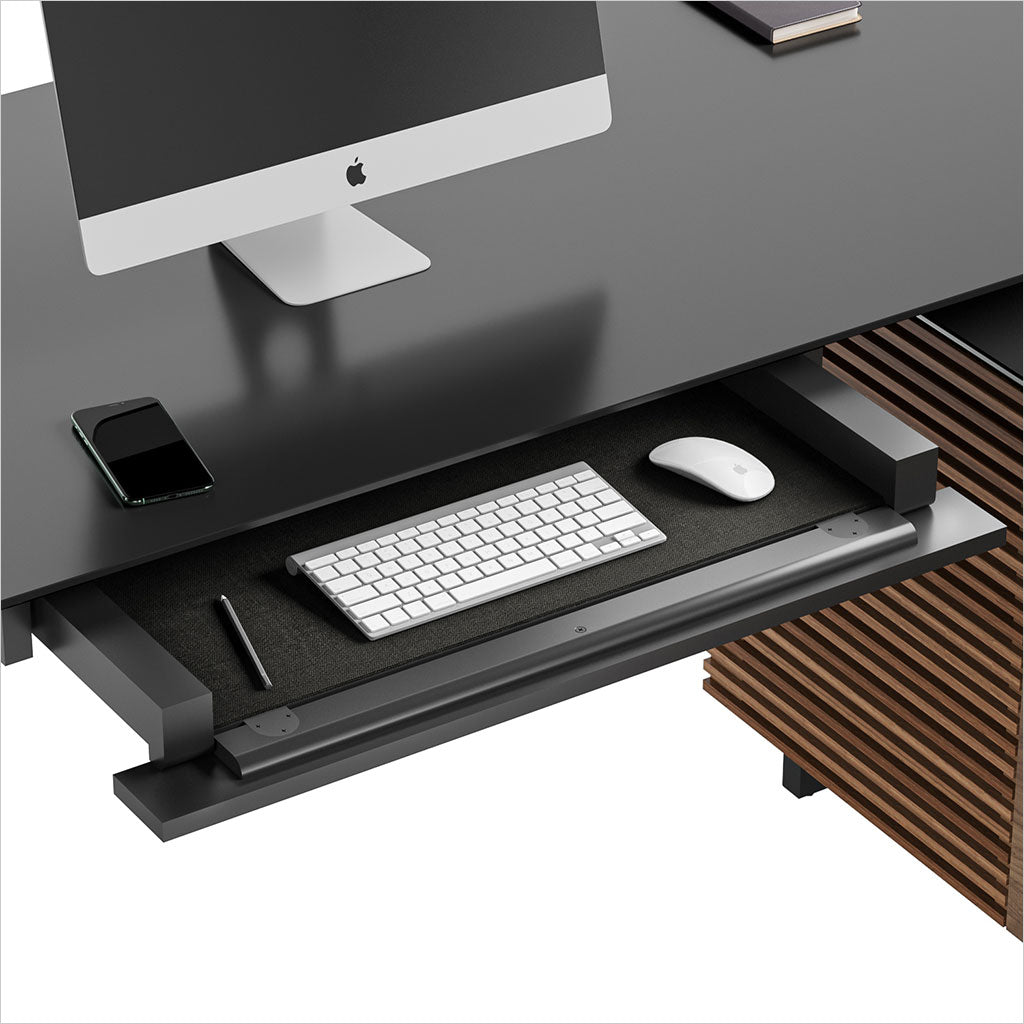 https://www.scandesign.com/cdn/shop/products/1060-corridor-l-desk-6531-BDI-modern-executive-desk-WL-1-keyboard-storage-drawer_1200x.jpg?v=1636406698
