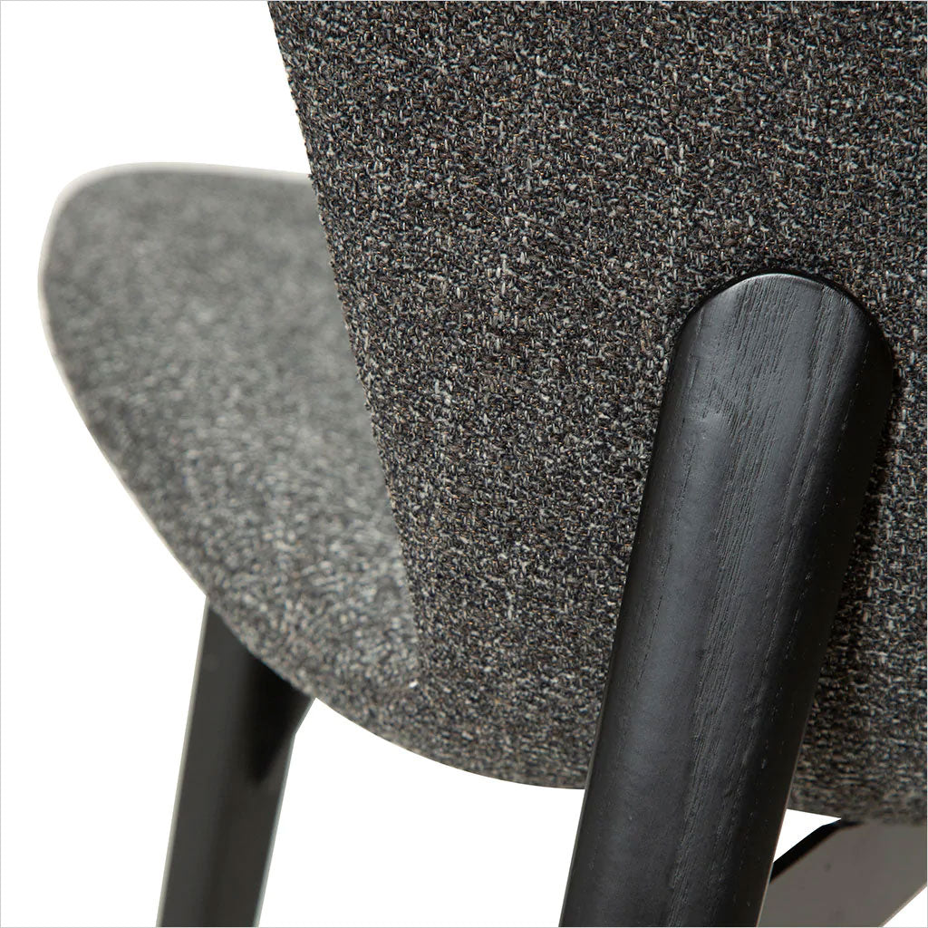 grey fabric counter stool with black legs