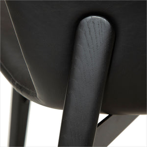 black leather counter stool with black legs