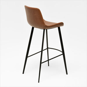 barstool with baseball stitching along edges and curves