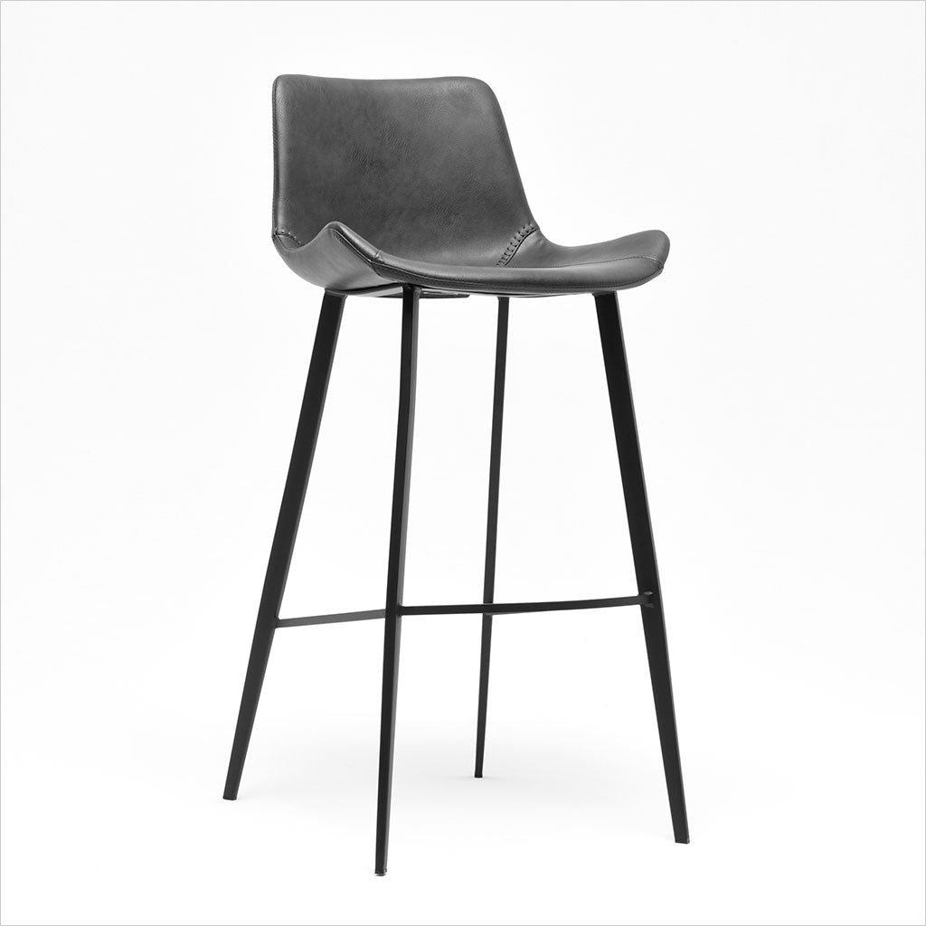 barstool with baseball stitching along edges and curves