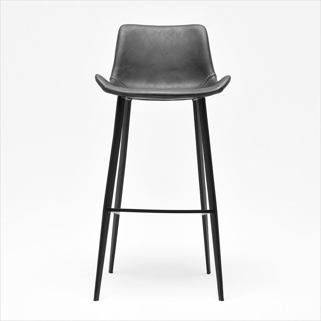 barstool with baseball stitching along edges and curves