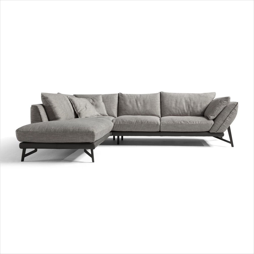 sectional clad in fabric and leather