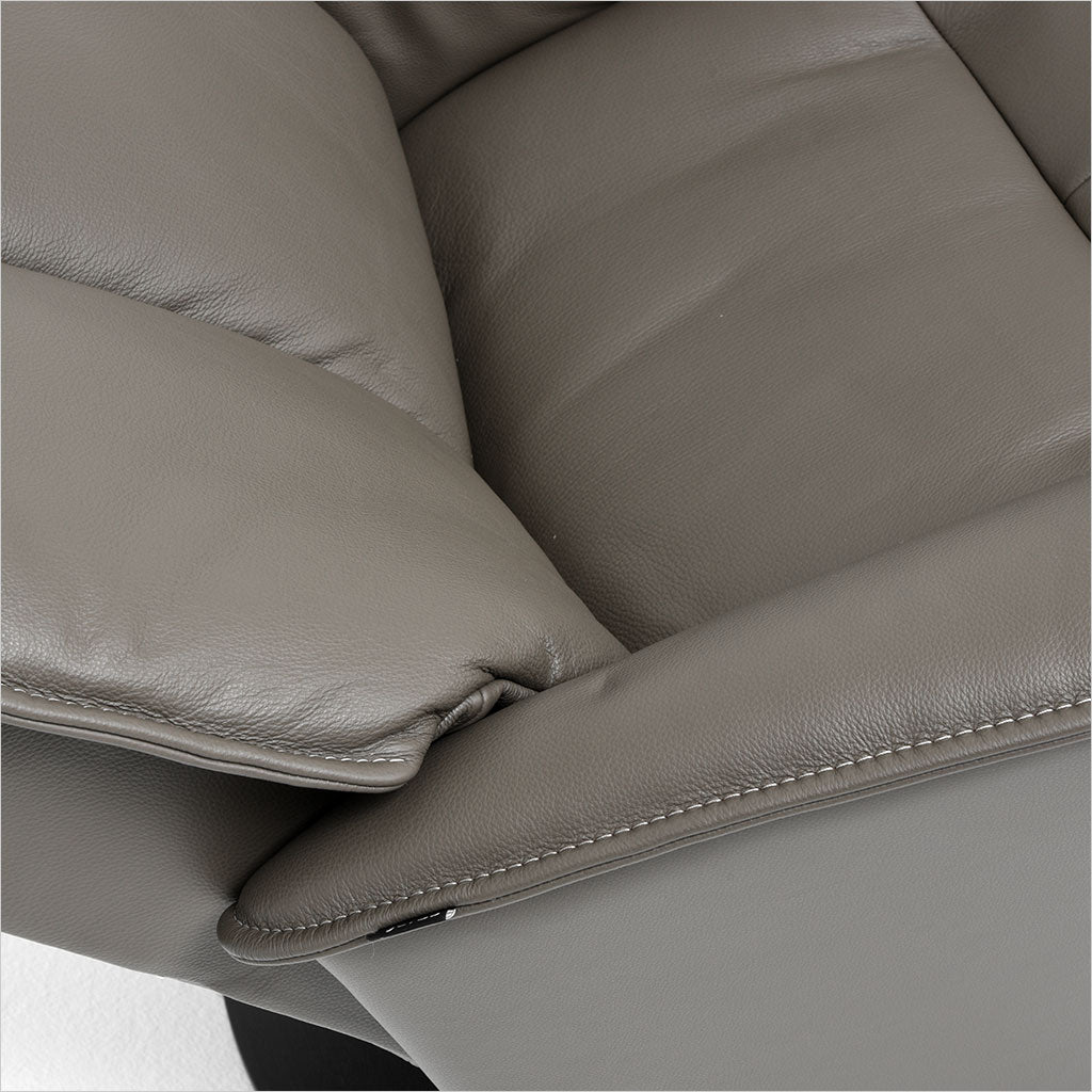 brown leather recliner with charcoal wood base