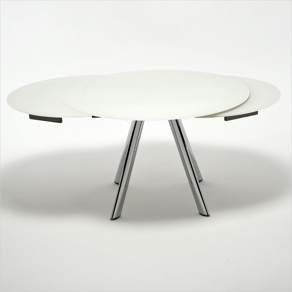expandable, round glass top table with metal legs