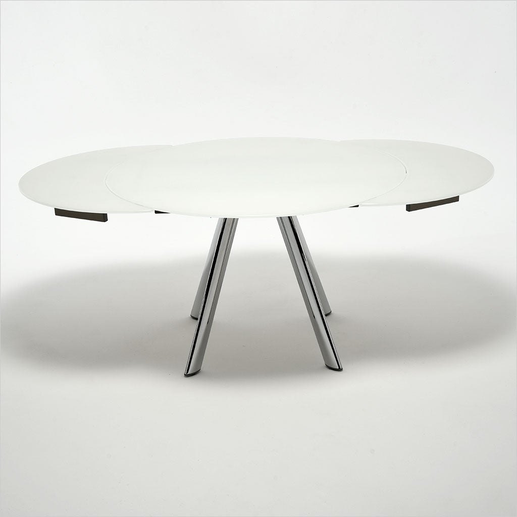 expandable, round glass top table with metal legs