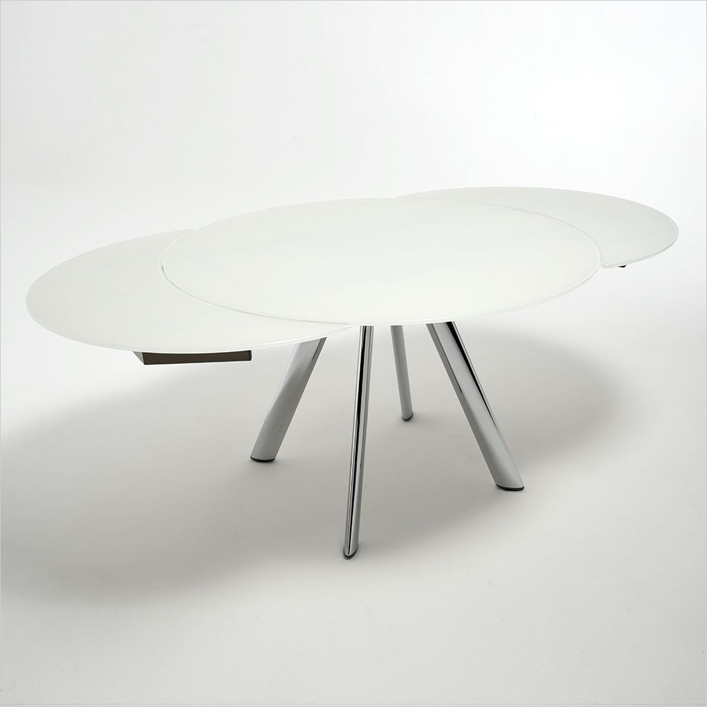 expandable, round glass top table with metal legs