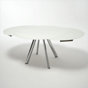 expandable, round glass top table with metal legs