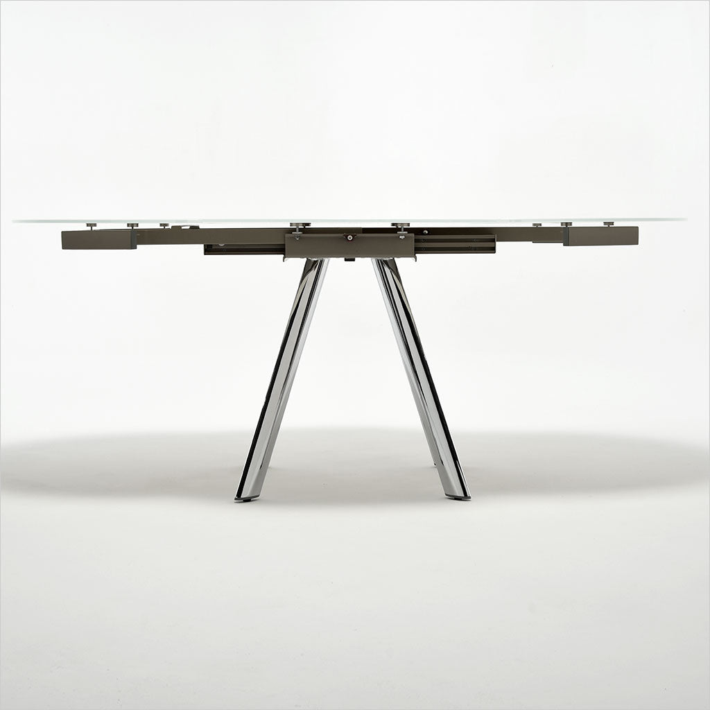 expandable, round glass top table with metal legs