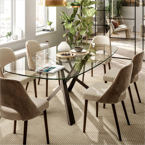 oval dining table with glass top and bronze coated metal base