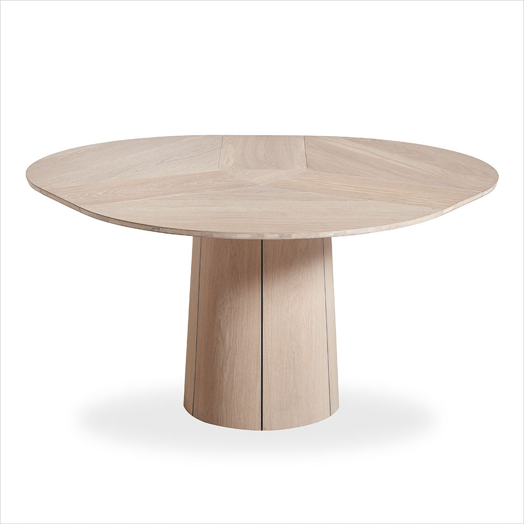 round dining table with extension leaves and pedestal base