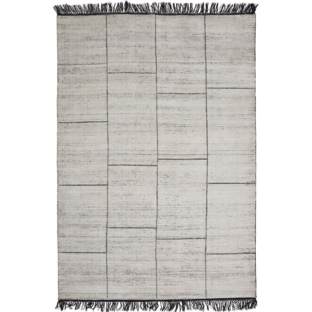 white and black loom-knotted area rug