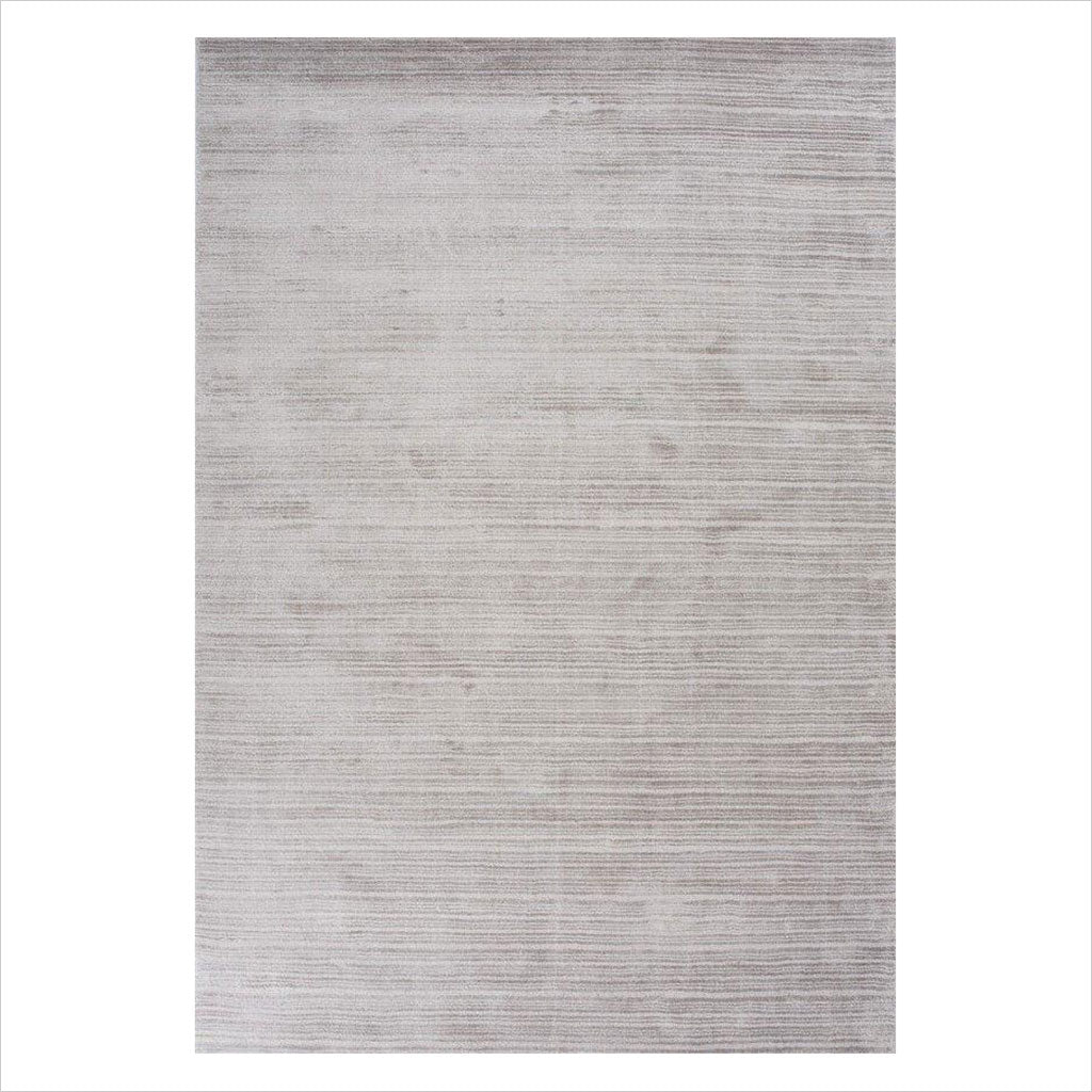 hand-loomed area rug in grey