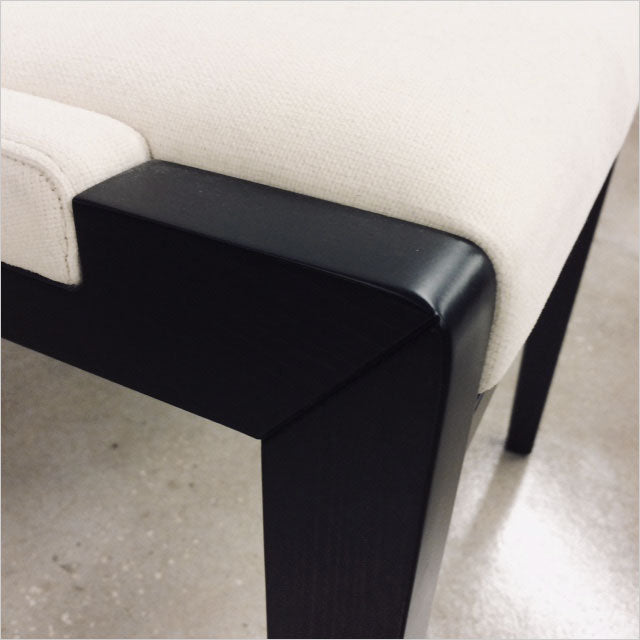 high back dining chair upholstered in white fabric