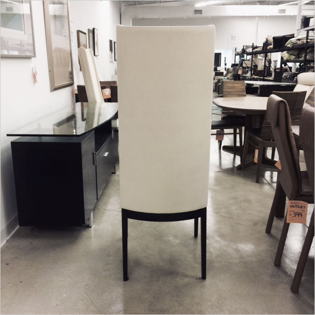 high back dining chair upholstered in white fabric